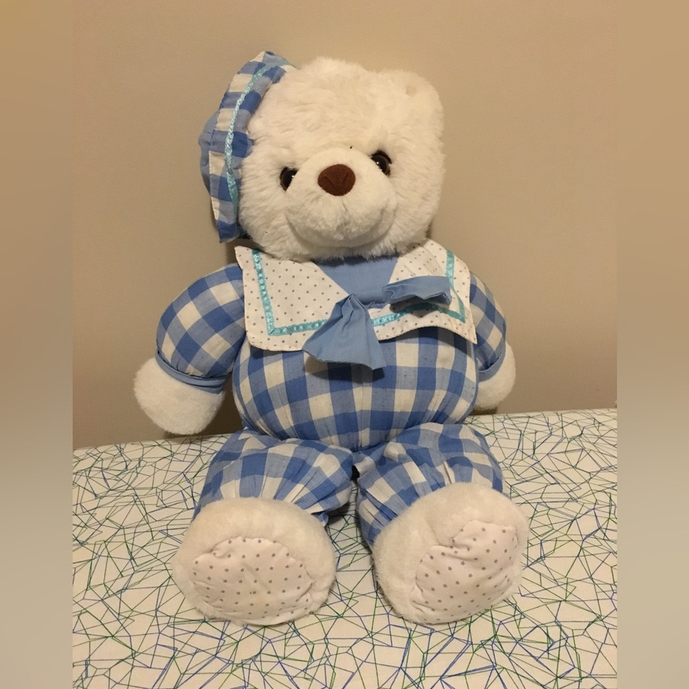 A dressed stuffed bear.